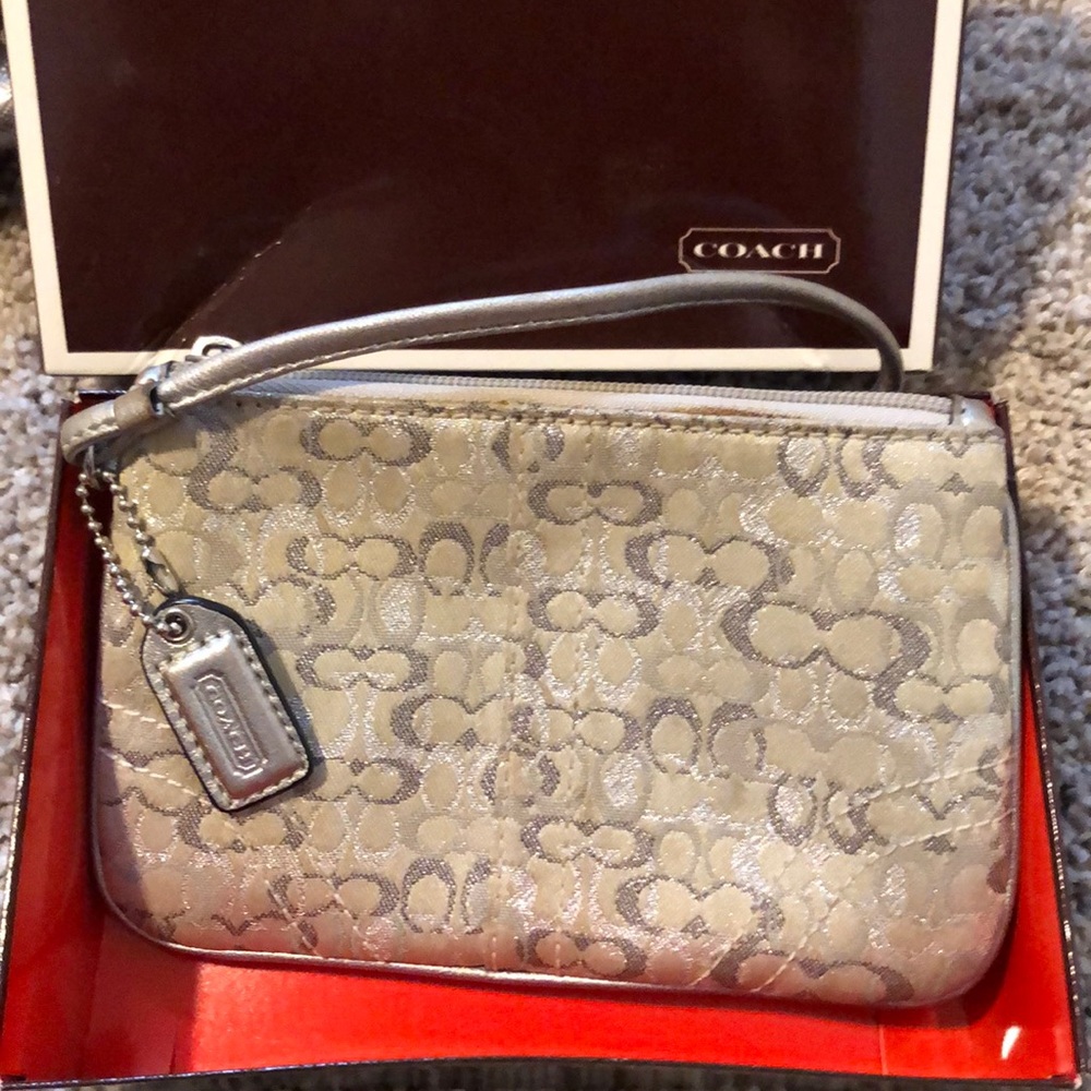 Gray Monogrammed coach wrestling